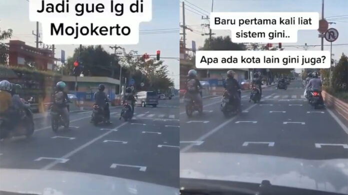 Kawasan Lampu Merah Diberi Garis Putih Seperti Sirkuit Balapan Untuk Pengendara Jaga Jarak